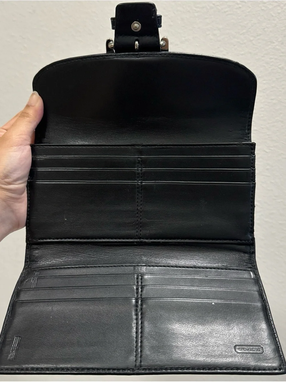Coach Black Leather Clutch with Buckle Accent